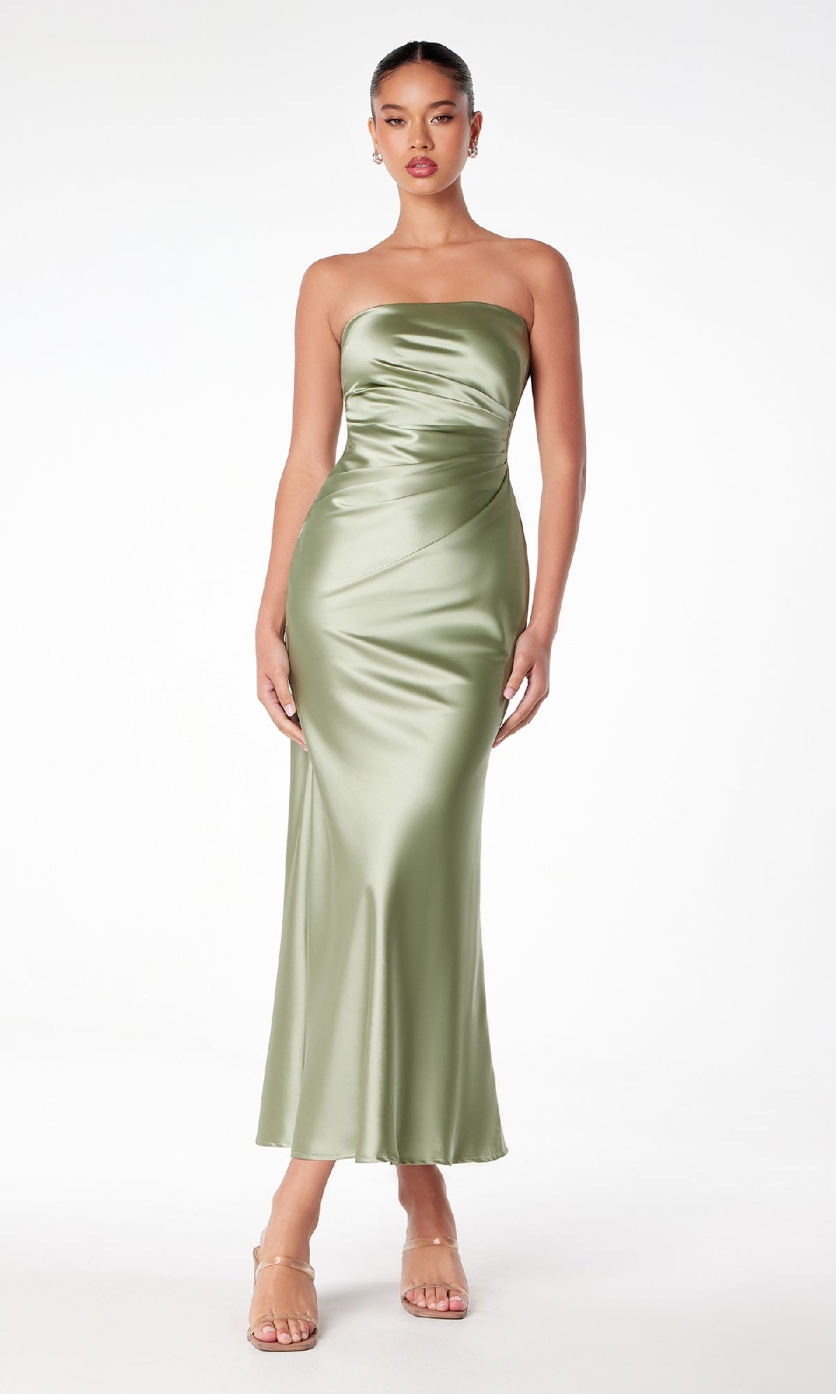 Woman wearing the Astee T2006 Strapless Long Satin Maxi Prom Dress in light green, featuring a fitted bodice and ankle-length hem, standing against a plain white background.